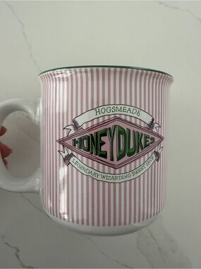 Warner Bros. Pink Stripe Honeydukes Ceramic Mug with Green Logo